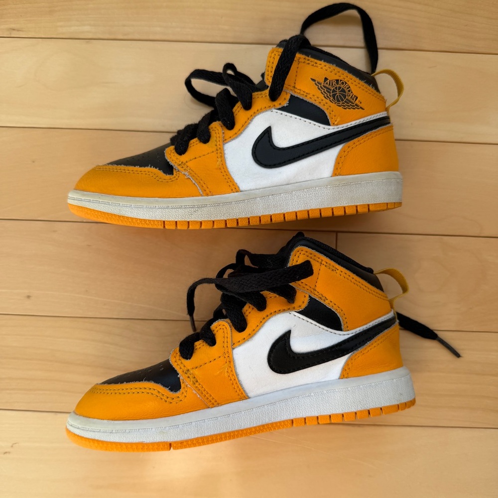 Nike Air Jordan 1 Mid sneakers in the "Taxi/Black/White" colorway size kids 11C